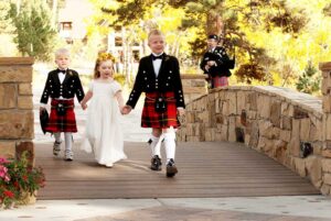 Bagpiper with kids